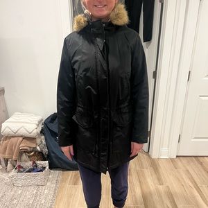 Levi & Strauss Co. Black women’s jacket, fur hood, fully lined.